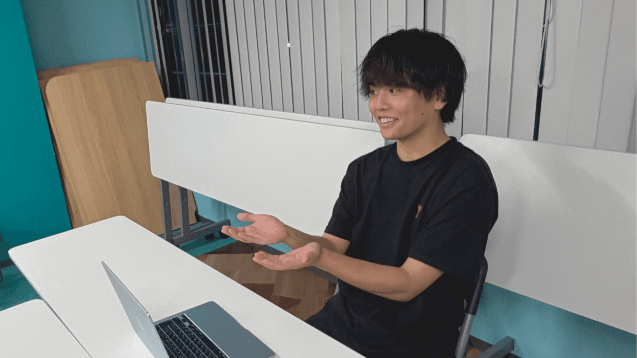 インタビューに答える門田さん
